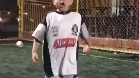 A child juggles a ball
