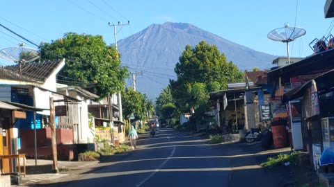 village atmosphere on a tropical island with views of the volcano