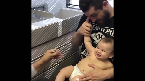 Doctor distracts baby from her shots with goofy tune