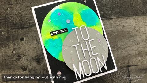 Creating a card with a moon using an embossing folder.
