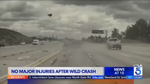Car launched into air by runaway tire