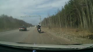 Motorcycle Crash With Near Miss to Oncoming Traffic