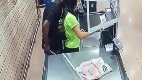 African "asylum seeker" threatens a female supermarket employee in Spain with