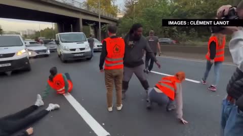 Fed-up French motorists haul off climate cult blocking the A6 near the Paris-Orly Airport.