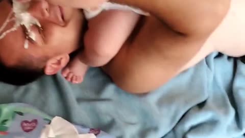 Baby Pukes on Dad's Face