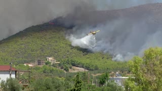 Wildfires burn outside Athens, villages evacuated