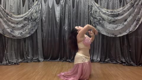 Thea tests out her $5 bellydance cost