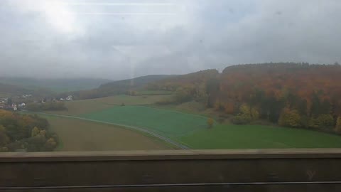 German countryside & farmlands at 300 km/hr on Deutsche Bahn's ICE train