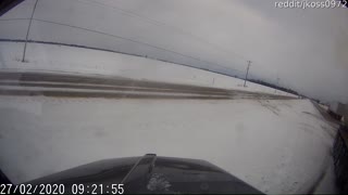 Black Ice Makes Semi Slide