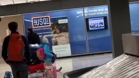 Dad Drags Daughter Through Airport