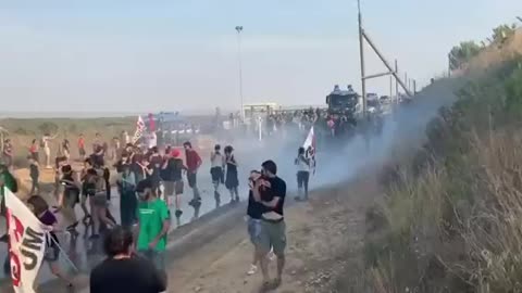 NATO sprays protesters in Sicily