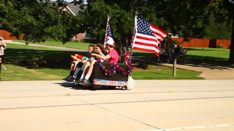 Motorized couch and 4th of July Parade.