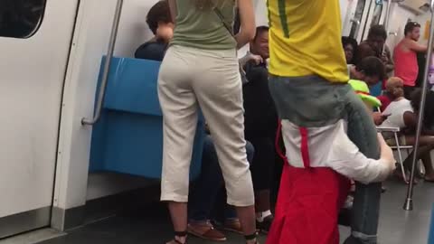 Mario Gives Tipsy Guy A Piggyback Ride In Brazil Metro