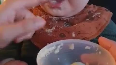 Baby eats in Unconventional way