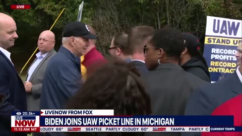 Biden joins UAW picket line in Michigan, stands with autoworkers
