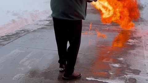 Dad Uses Flamethrower For Snow Removal