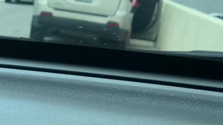 Vehicle Whacks Freeway Wall