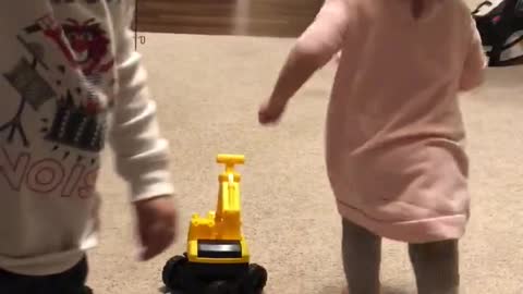 Adorable toddlers showing their love for each other