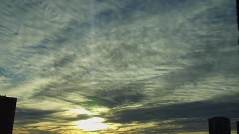 Sunset with orange wavy clouds