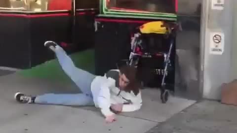 Guy skateboard get stuck on metal falls off sidewalk