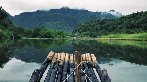 Raft going slowly down a river