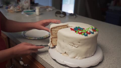 Birthday Cake Cutting Slow Motion Closeup