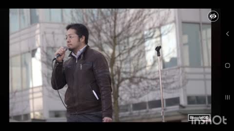 Dr. Daniel Nagase spoke to a crowd gathered at Jack Poole Plaza, Vancouver, March 19, 2022.