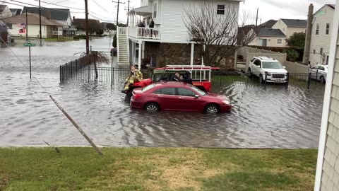 Just another day in New Jersey saving some stupid people from a flood, why would you drive in this?