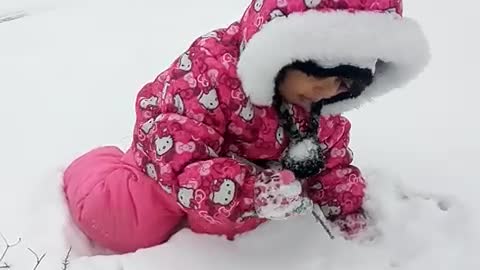 snow eating baby