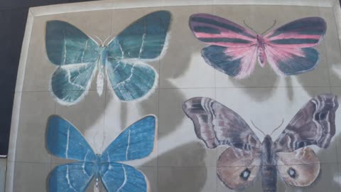 Las Vegas' Fremont Butterfly Mural and Atomic Liquors: Five stories of wings and one of martinis