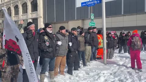 Protesters in Ottawa face the police.