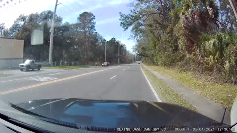 Turning Tow Truck Loses Load