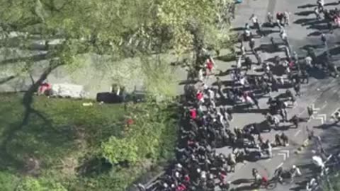 Large group of African migrants gathered at City Hall New York City of receiving green cards