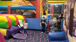 Spencer at @Play bounce house VID_20180520_165332