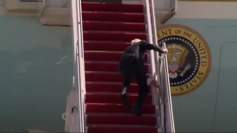 President Joe Biden falls on Airplane Stairs Continuously