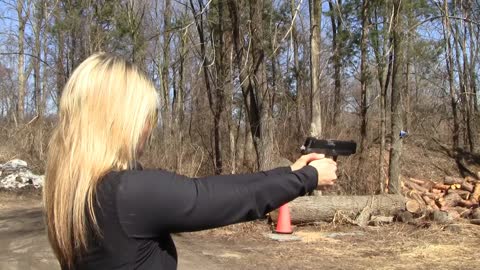 Her first time shooting a handgun!