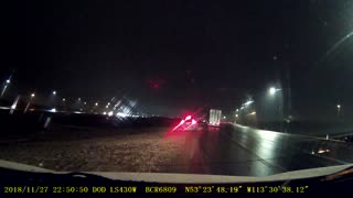 Icy Roads Cause Semi to Plow Into Car and Tip Over