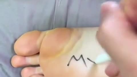 Draw on her foot