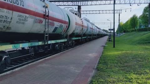 Cargo Train Moving on Railway