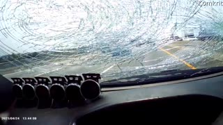 Truck Tire Flings Road Debris through Windshield