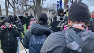 Minnesota: CNN Crew Member Gets Bottle To Head, Fakes Falling Out