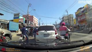 Lane-Splitting Motorcyclist Meets Open Car Door