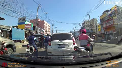 Lane-Splitting Motorcyclist Meets Open Car Door