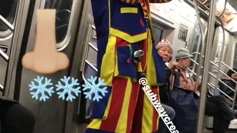 Clown on subway train blows up a balloon animal using his nose