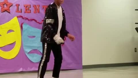 Kid Flawlessly Pulls Off Michael Jackson Dance Moves At Talent Show nice