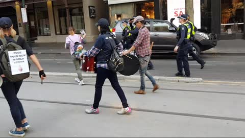 Police Officers Tried To Run Over Drummers During Melbourne Street Protest Rally