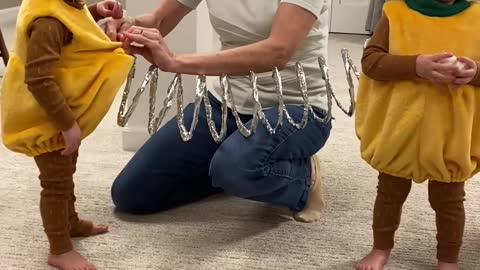 Twin Toddlers Dress Up as Slinky Dog for Halloween