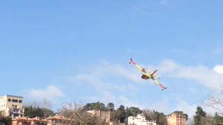 Firefighter Plane Lands in Italian Lake