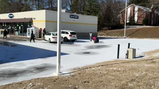 SUV Slides Down Hill and Collides With Car in Icy Parking Lot