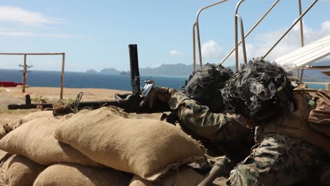 US Marines Handle M240B Machine Guns and Mk 19 Grenade Launchers